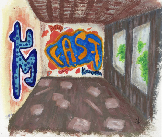Painting of brightly colored graffiti on the walls of an abandoned building